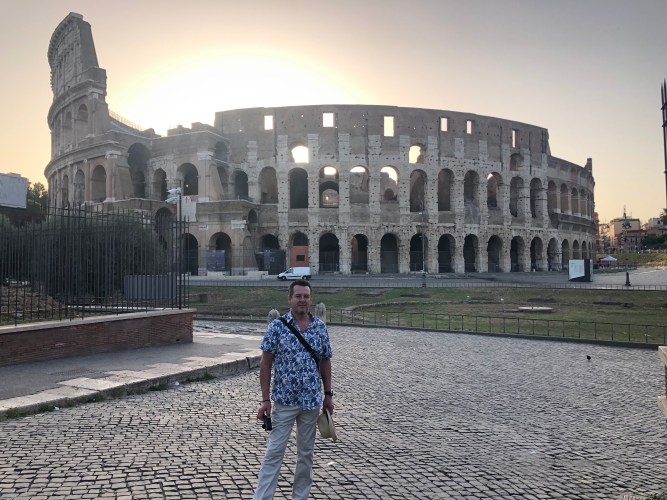 Standing outside the Colosseum in Rome at 7am